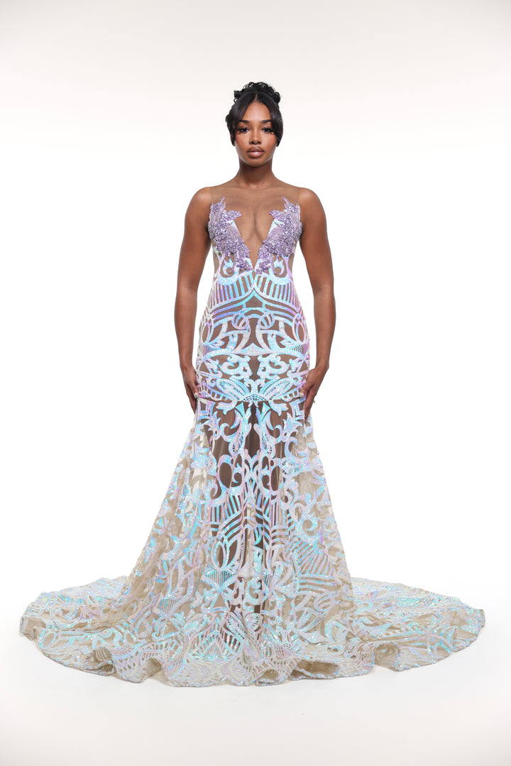 Woman wearing a detailed evening gown on a white background